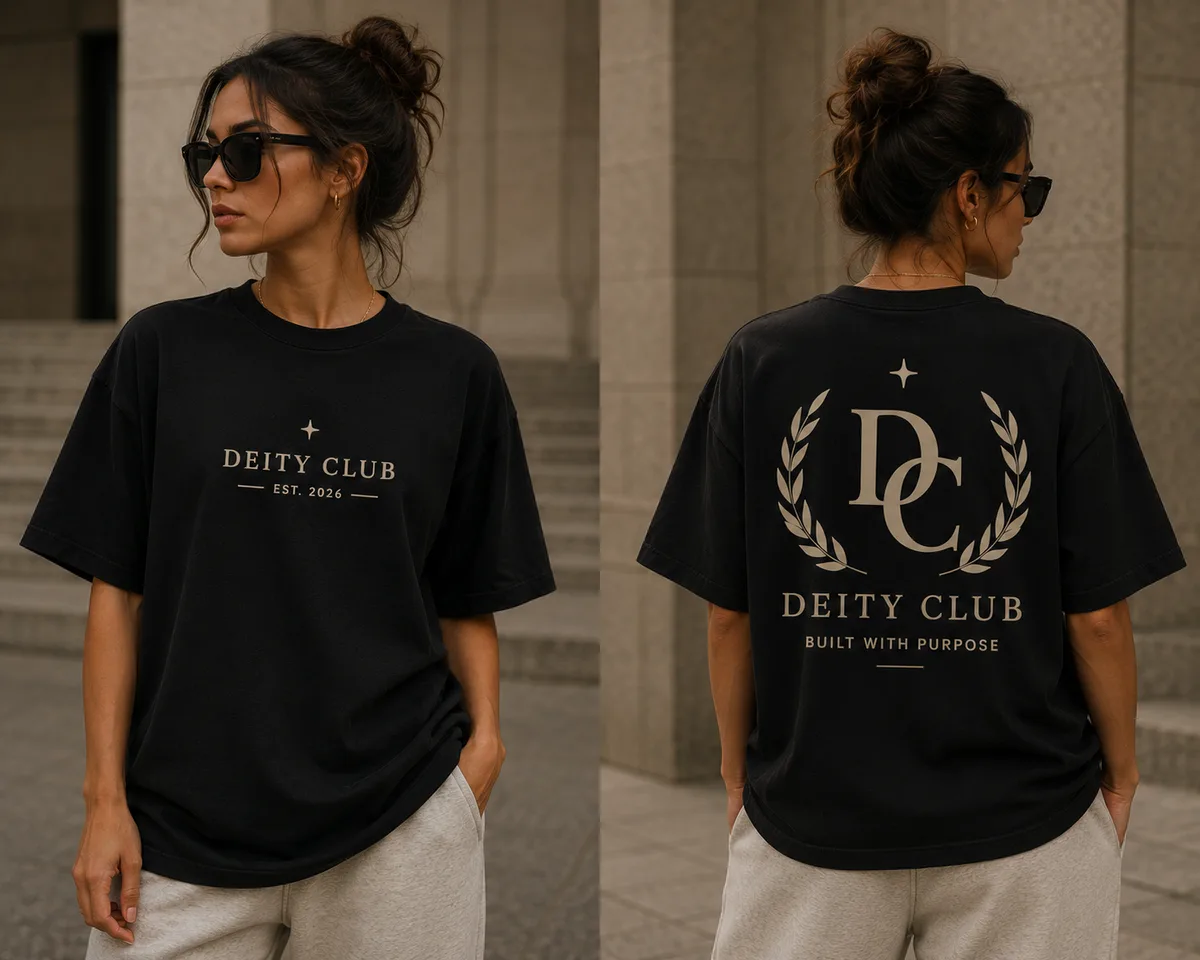 Deity Club Vol. I oversized tee — front chest wordmark and back laurel mark, worn by a model